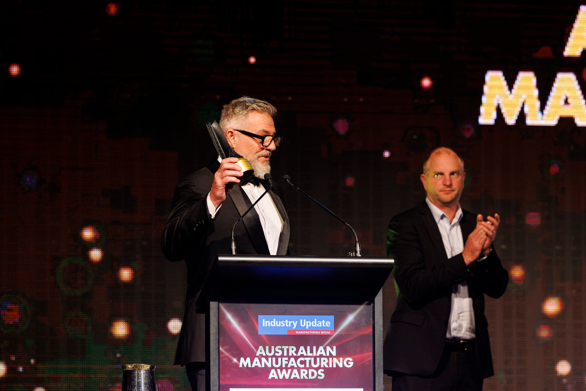 Mathew Dow accepting the Gold Award for Excellence in Manufacturing, Male at the 2026 Australian Manufacturing Awards.